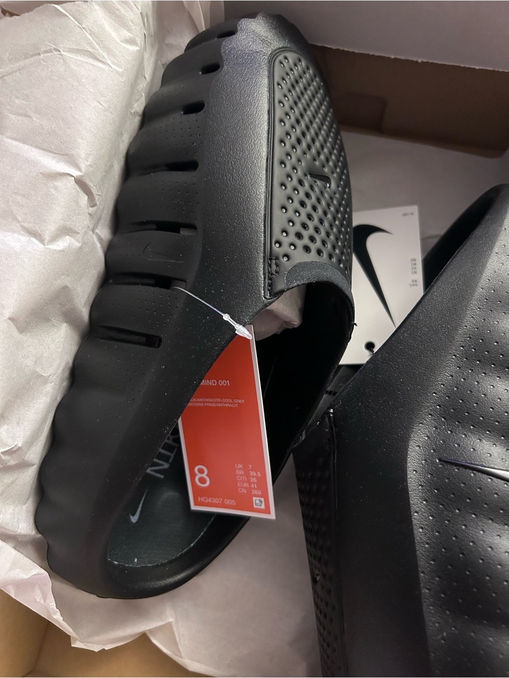 Nike Black Menโs Slip-On Foam Slides